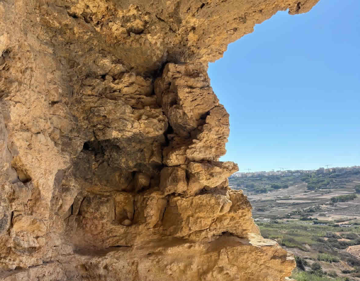 Tal-Mixta Cave viewpoint overlooking Ramla Bay