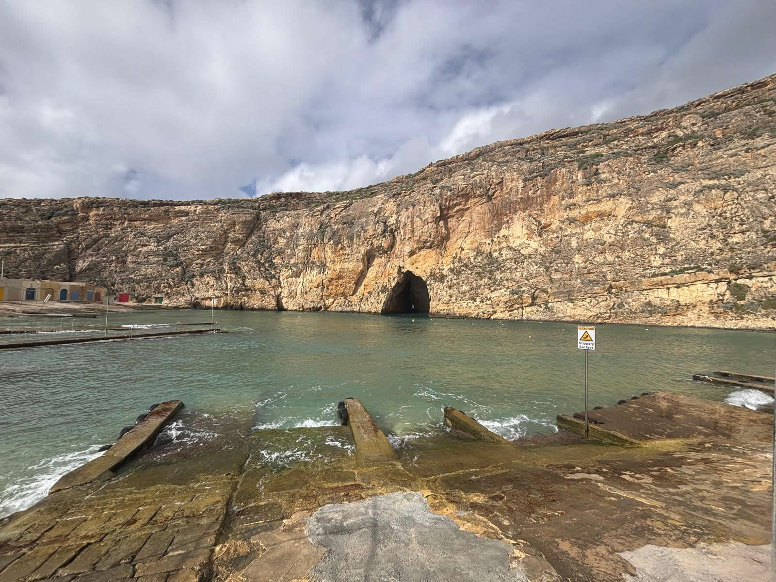 Inland Sea at Dwejra, Gozo, showing the boat ramps, sheltered water and entrance to the sea tunnel