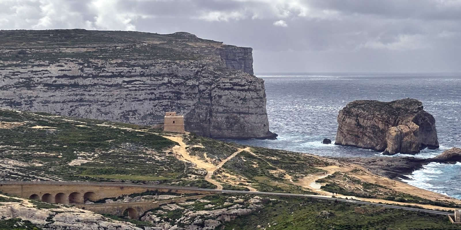 View of Fungus Rock, Dwejra Tower and the cliffs at Dwejra, Gozo